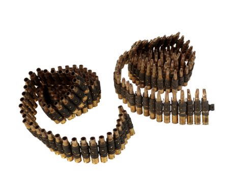 A 7.62 FIRED MACHINE GUN AMMUNITION BELT and 5.56 fired machine gun ammunition belt  and cartridges (2)