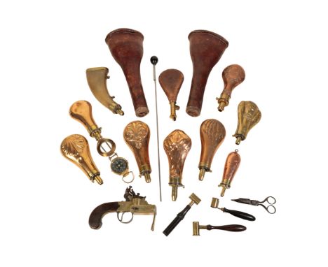 A COLLECTION OF VARIOUS COPPER AND BRASS SHOT FLASKS, two powder horns, two leather gun holsters, a tinder lighter, and other