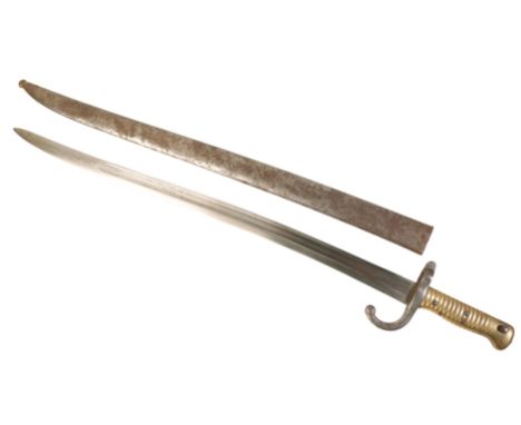 A CHASSEPOT BAYONET circa 1899, with brass reeded grip and original metal scabbard, no F63965, 69cm long