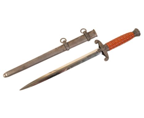 A GERMAN ARMY OFFICER'S DAGGER with a yellow reeded Bakelite grip and plated blade, in its' origial metal scabbard, 37cm long