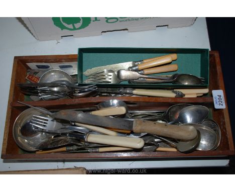 A quantity of mixed Cutlery including Silver spoon, Silver fork and silver banded fish knives and forks.