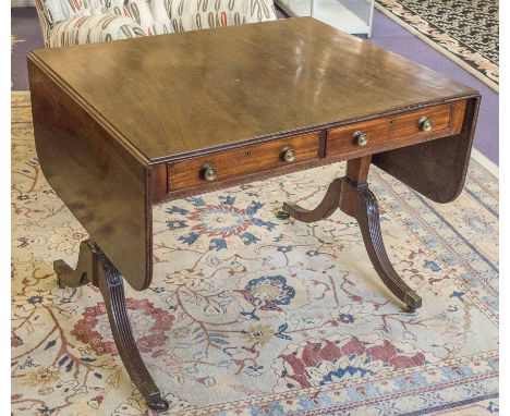 SOFA TABLE, Regency mahogany, circa 1820, with hinged rectangular top above two real and opposing dummy drawers, 72cm H x 94c