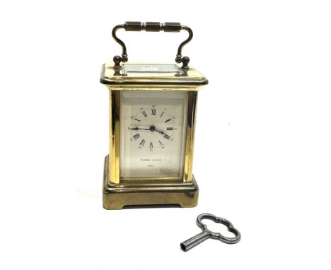 Pierre jacot Paris carriage clock measures approx height 8cm by 5.7cm wide working order with key 