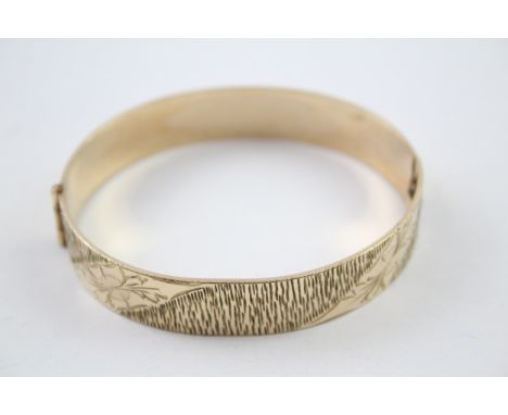 A rolled gold bangle 50 microns (27g) 