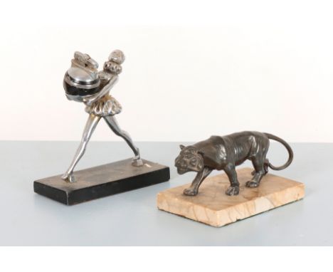 A RONSON FIGURAL CHROMED METAL TABLE LIGHTERmodelled as a standing girl in a tutu offering a tray, 17cm high; together with a