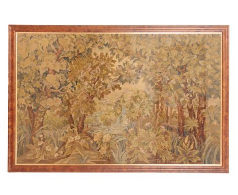 AN ENGLISH NEEDLEWORK TAPESTRY signed F. B. H and dated 1949, depicting a verdure landscape with a waterfall to the distance,