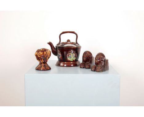 A BARGEWARE TEAPOT19th century, worded 'A Present to a Friend' with stand; together with a pair of 19th century treacle-glaze