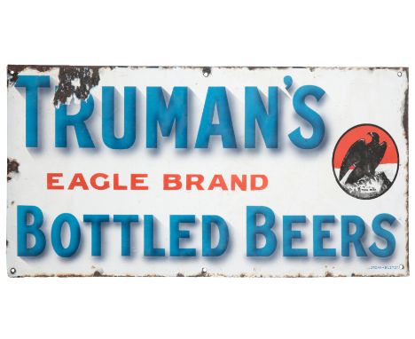 A PAINTED ENAMEL ADVERTISING SIGN FOR 'TRUMAN'S EAGLE BRAND BOTTLED BEERS'boldly lettered in blue with eagle trade mark withi