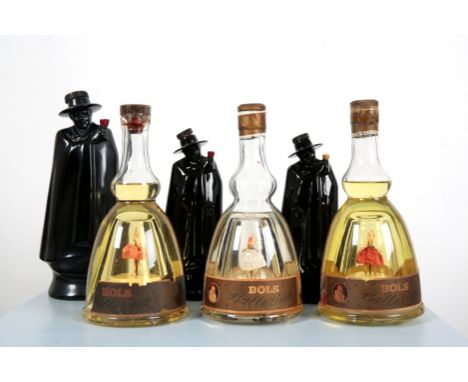 THREE BOLS 'BALLERINA' MUSICAL DECANTERSwith unopened contents, two with red skirts, one with a white skirt, 24.5cm high; tog