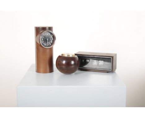 A SEIKO 'TRANSISTOR' SIMULATED LOG AND CHROME CYLINDRICAL CLOCK mid-century modern, 25cm high x 9.5cm long x 11cm deep; toget