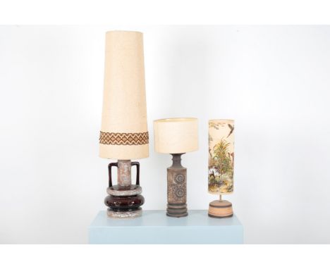 THREE FAT LAVA MID-CENTURY MODERN LAMPSprobably West German, the first with circular piercings to the ceramic base and tall t