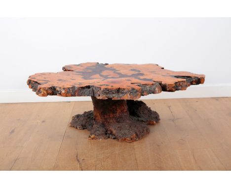 A BURL WOOD ROOT, TREE TRUNK AND AMBER RESIN LOW TABLE by the 'Burlwood Co., Reading, California, No. 44601', the underside w