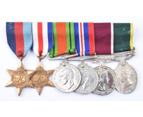 A World War Two group of six medals awarded to 5124597 RQMS Warrant Officer Robert Gerald Brown 1 Corps District Ordnance Com