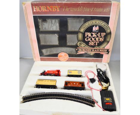 A Hornby Railways Pick-up goods set, HO gauge, together with Jouef Marque Deposee model kit of a station and a model kit of a