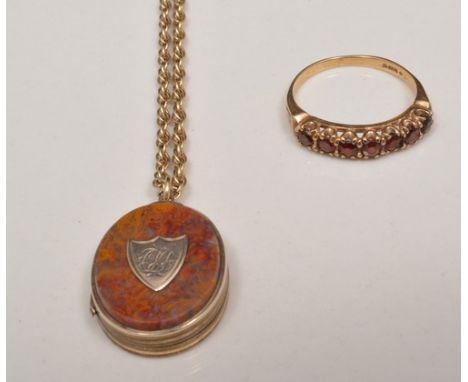 Hardstone faced yellow metal locket, monogram shield cartouche on a Prince of Wales link chain, with a 9ct garnet set off ete