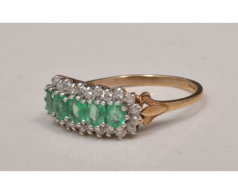 9ct gold diamond and emerald cluster ring, five oval emeralds surrounded by diamond points.