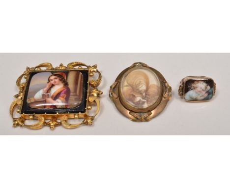 Large yellow metal brooch, set with cushion shape porcelain panel, width 70mm, a 9ct ring set with a porcelain panel and an o
