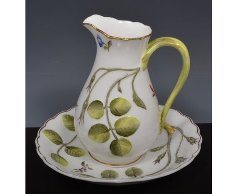 Royal Worcester bone china pear shape jug, a Blind Earl pattern, 14cm, a matching saucer and dessert plate.