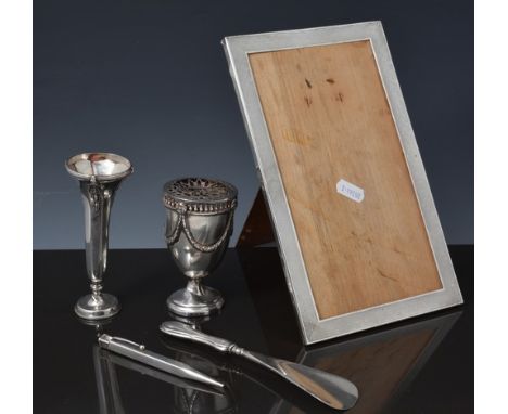 Rectangular silver photograph frame, Birmingham 1924, engine turned, 25cm x 15cm, an Edwardian silver shape pedestal vase, a 