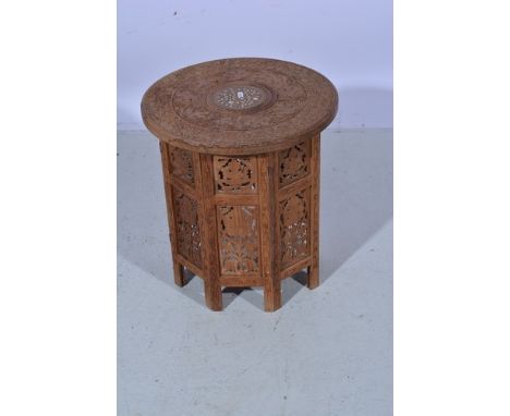 Chinese porcelain barrel shape garden seat, floral decoration, 45cm and an Indian carved wood table (2).