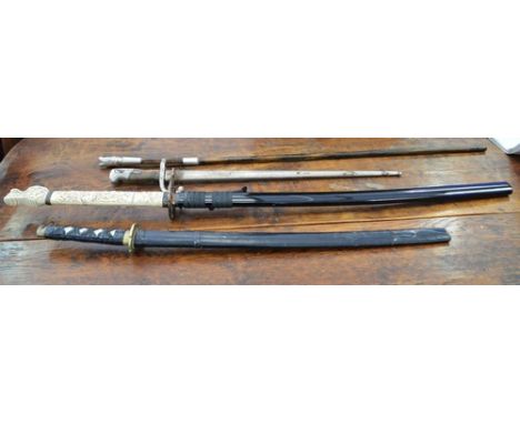 French bayonet, rusted into the scabbard, two reproduction Japanese swords and a reproduction walking stick (4).