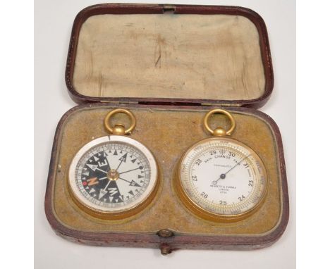 Gilt metal cased pocket barometer, signed Negretti and Zambra London 11700, a similar compass, cased.