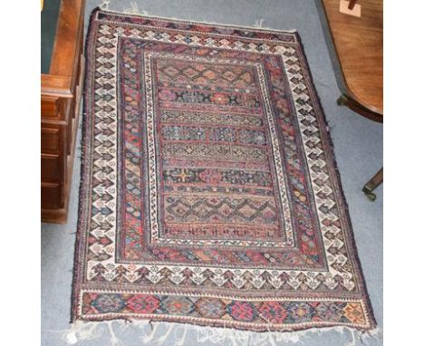 Afshar flat weave rug, the walnut brown and indigo field of bands of geometric motifs enclosed by reciprocal arrow head borde