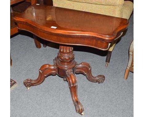 A Victorian mahogany centre pedestal foldover card table, 89cm by 44cm by 70cm 