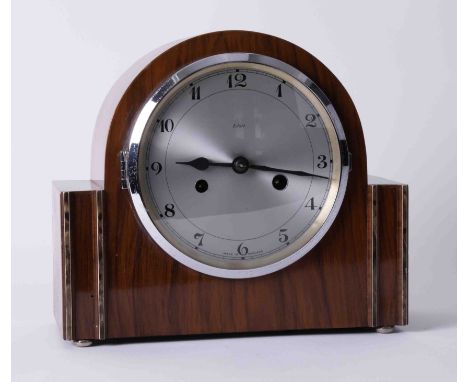 Enfield, a walnut cased eight day mantel clock with gong strike.
