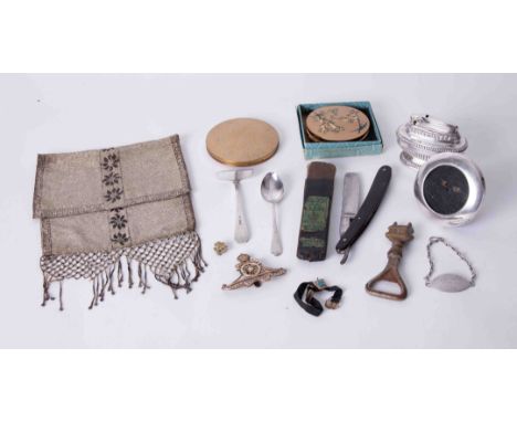 A mixed lot of powder compacts, Ronson lighter, small silver photo frame, artillery badge, razor, etc.