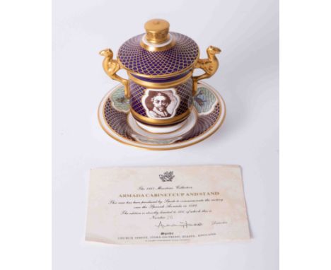 A Spode porcelain Armada cabinet cup &amp; stand, limited edition 26/500, with certificate, height 13cm.