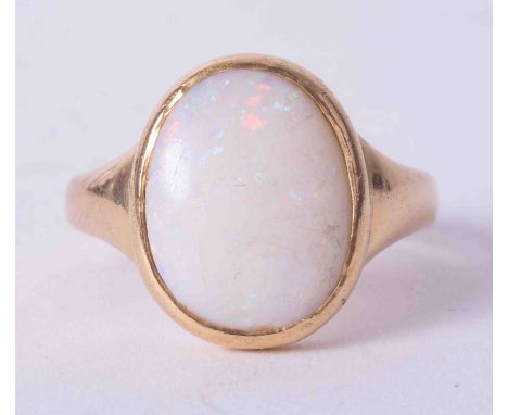 An 18ct and opal set ring, approx. 6.6oz.