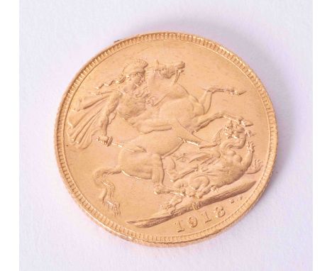 A George V full gold sovereign dated 1918 (M).