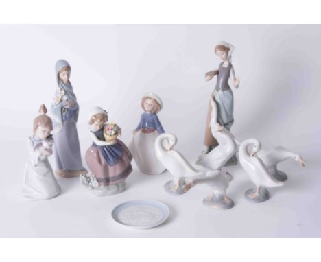 A mixed collection including ten Lladro figures and one Nao figure, (11).