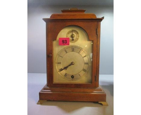An early 20th century German oak mantle clock, the movement marked W & H Sch, 11 3/4"h x 8"w 