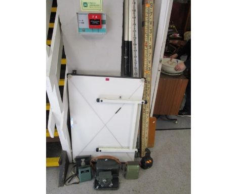 A quantity of surveyors and architects equipment to include a drawing board, rulers, theodlites, an automatic level and other