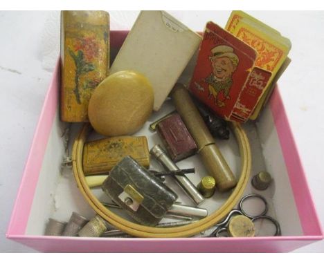 Mixed collectible items to include playing cards, a needle case, a whistle, silver thimbles and other items 