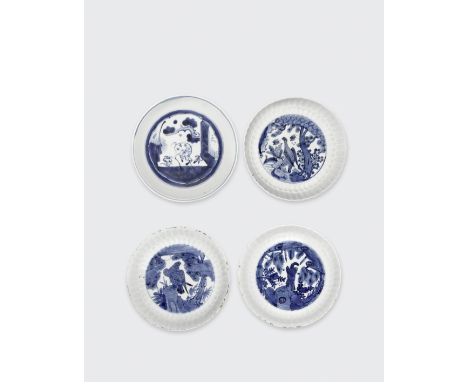 A group of four blue and white export dishesLate MingIncluding three similar deep dishes, each with a chrysanthemum petal pat