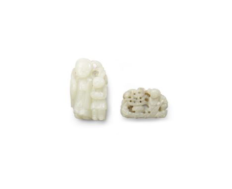 Two carved jade figural pendantsQing dynastyBoth of flat ovoid section, the first depicting a tall adult hooded figure standi