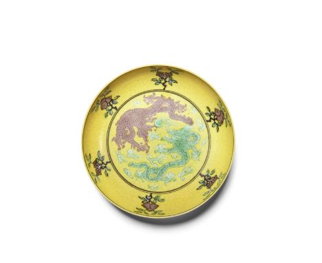 A fine yellow-ground aubergine and green-enameled 'dragon' saucer dishQianlong six-character markFinely incised and enameled 
