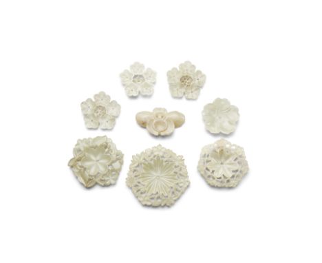 Eight jade flower-form buttonsIncluding one simple five-petal flower; one asymmetrical peony bud; one seven-petal flower surr