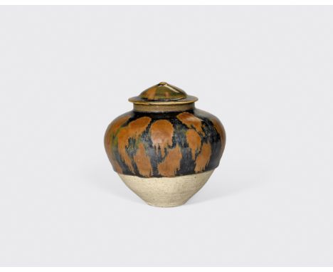 A Cizhou-type black glazed jar and a cover with russet-splashed decorationNorthern Song/Jin dynastyThe jar potted with an upr