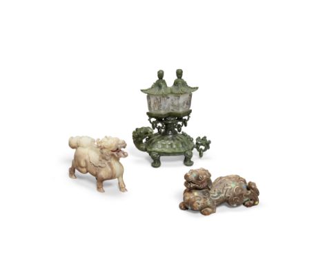 Three hardstone fantastic beastsThe largest a pieced spinach jade tortoise supporting  a double lantern with conforming cover