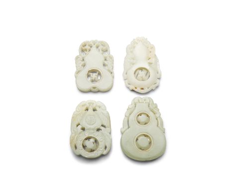 Four jade double-gourd form pendantsIncluding two similarly worked as hanging between bats with a movable wanzi-roundel in th