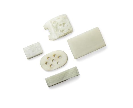 Five jade carvingsQing dynastyThe first a square section belt hook carved in relief with a chilong holding a flowering branch