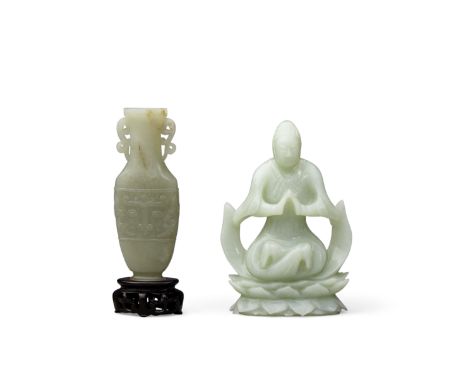 Two jade carvingsThe first a pale greenish-white jadeite seated Buddhist figure supported on a double lotus plinth; the secon