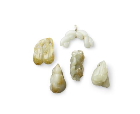 Five jade carvingsIncluding a pendant carved as a double-gourd issuing from a leafy stem; the second a pendant of a pair of m