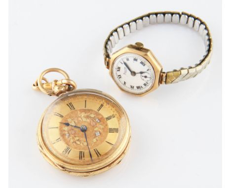 An 18ct yellow gold cased key wind pocket watch, the gold tone dial having hourly Roman numeral markers with inlaid wreath de