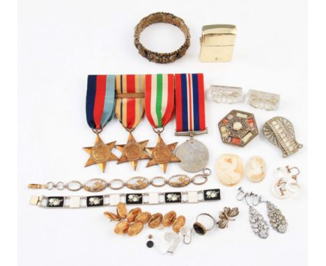 A lot of costume jewellery to include two silver bracelets, one with floral enamel detailing, both stamped Sterling, a Scotti