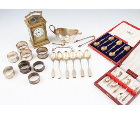 A lot to include a set of six silver anointing spoons, all hallmarked Birmingham 1952, in fitted box, a set of six silver cof